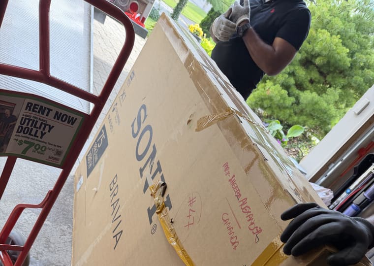 Bitlane mover carrying a wrapped box